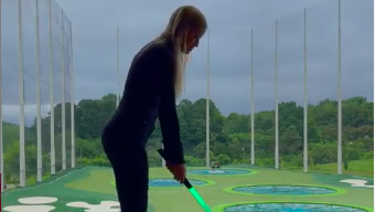 Golf fans react as Justine Ezarik hits golf ball with LIGHTSABER at TOPGOLF